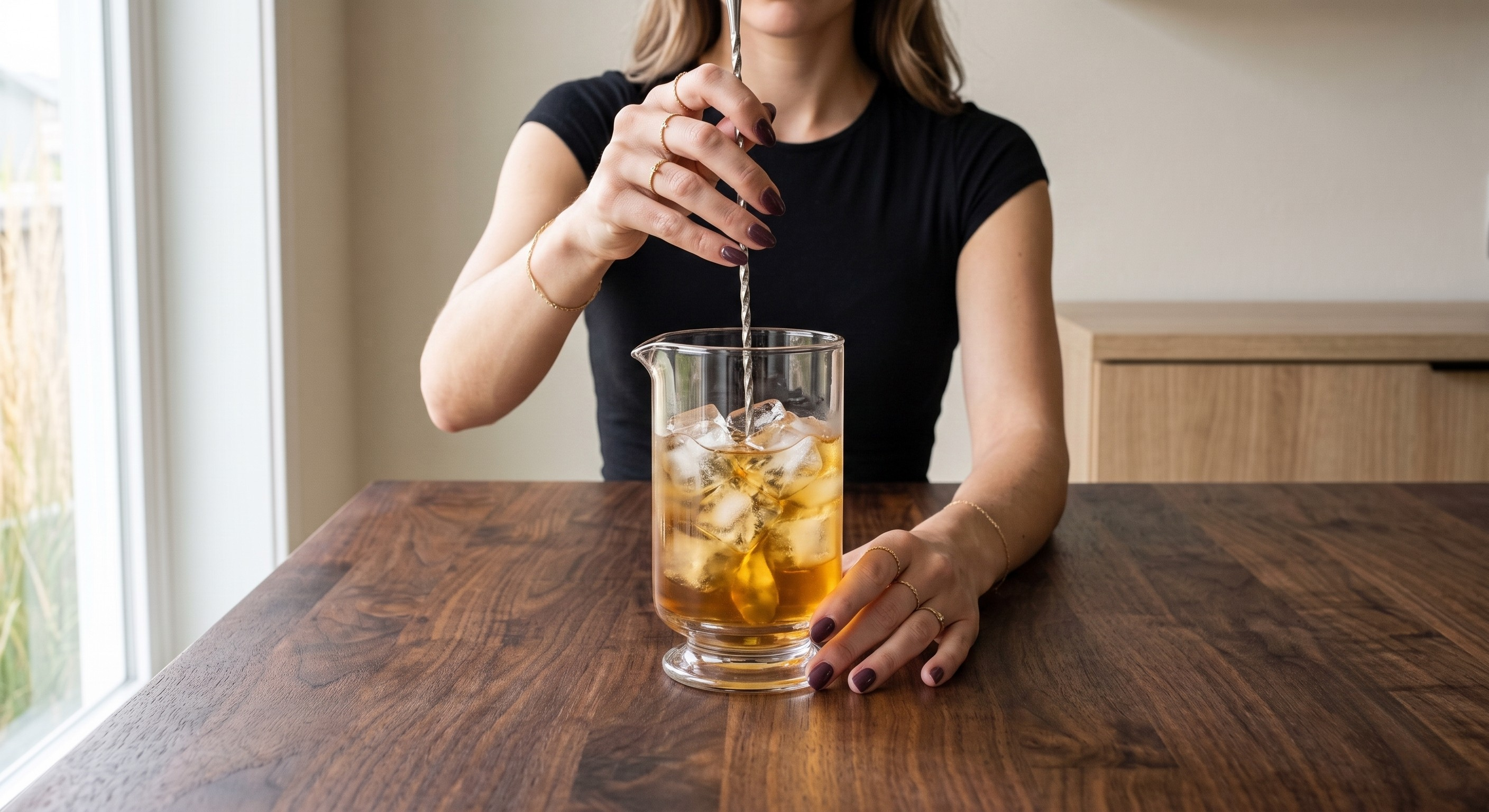 Stirring the Bourbon Lemonade Cooler