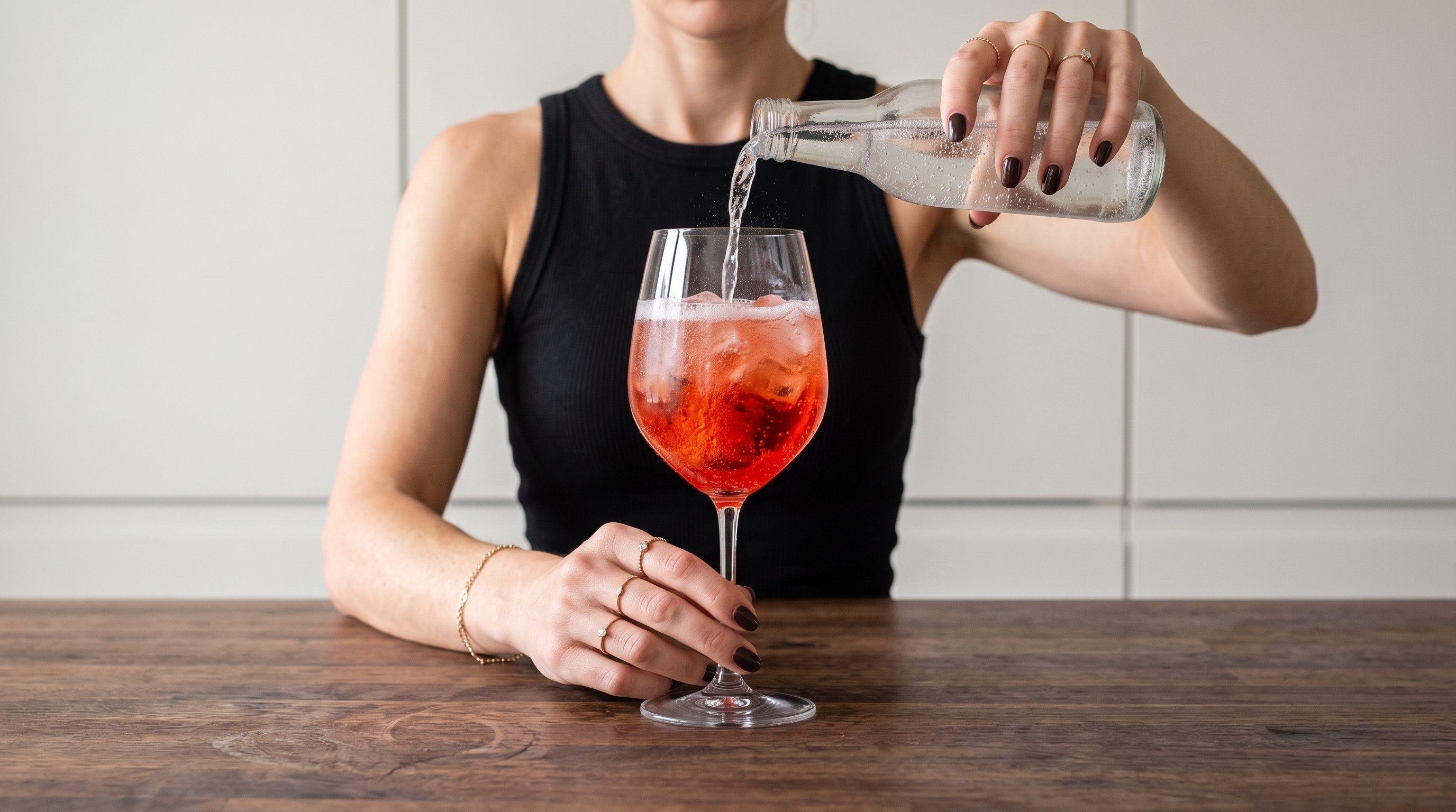 Stirring the Campari Spritz