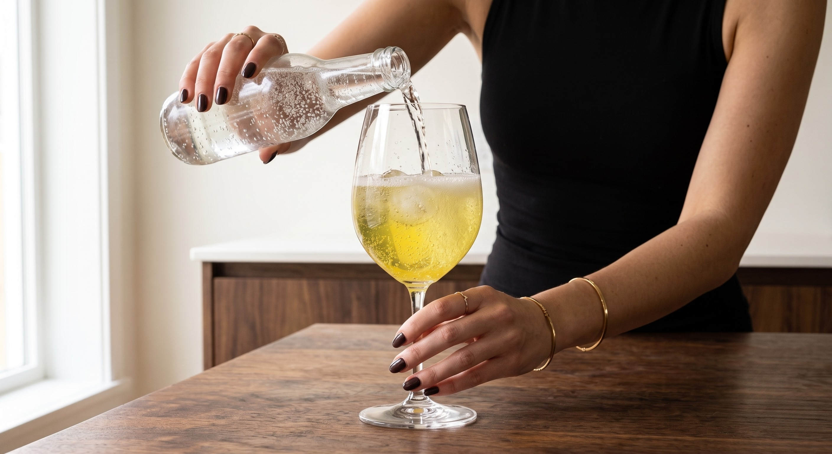 Stirring the Limoncello Spritz