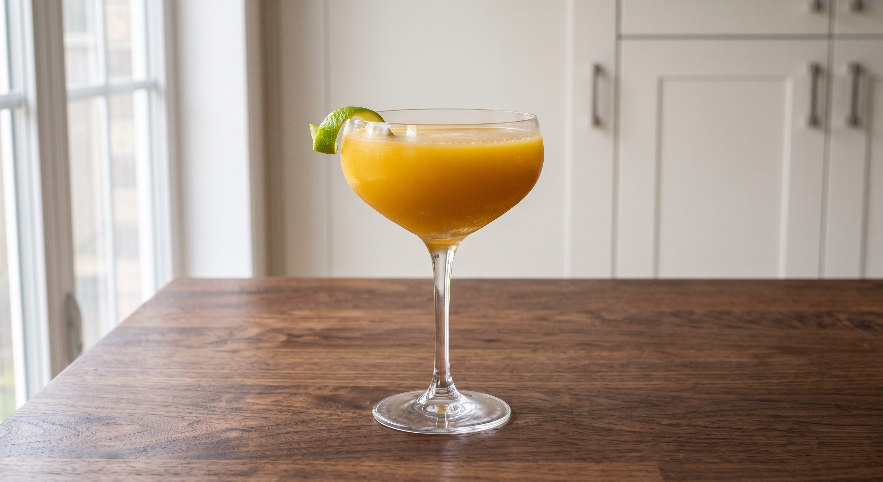 Mango Chilli Daiquiri cocktail served in a Coupe or martini glass